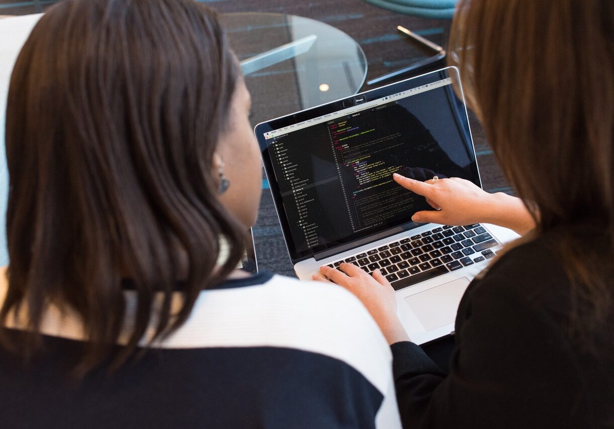 2 women at computer(How)